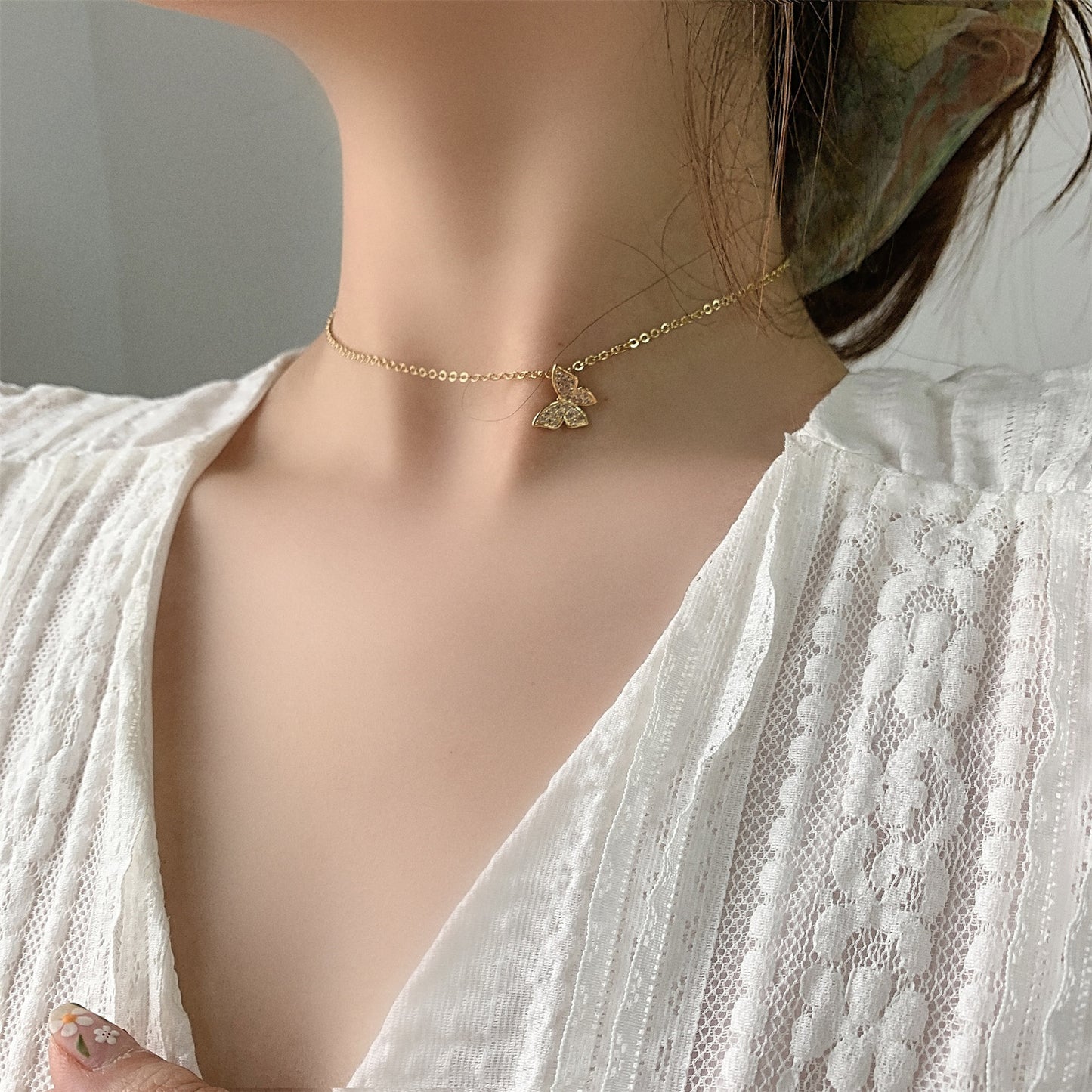 Multi-layered butterfly pearl necklace