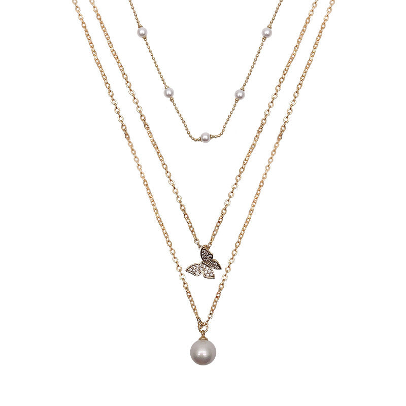 Multi-layered butterfly pearl necklace